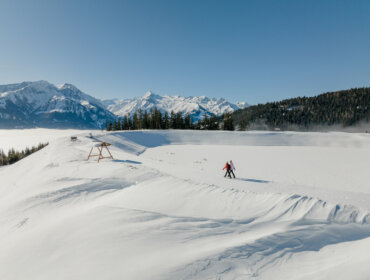 Zimní turistika okolo nádrže na Schmittenhöhe