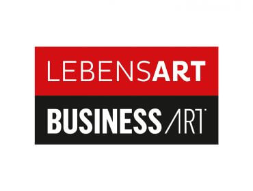 Logo mit LEBENSART in weiß auf rot und BUSINESS/ART in weiß auf schwarz, mit moderner fetter Schrift.