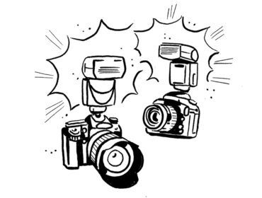 Zwei Kameras mit Blitzgeräten stehen sich gegenüber, umgeben von Aktionslinien im Comic-Stil.
