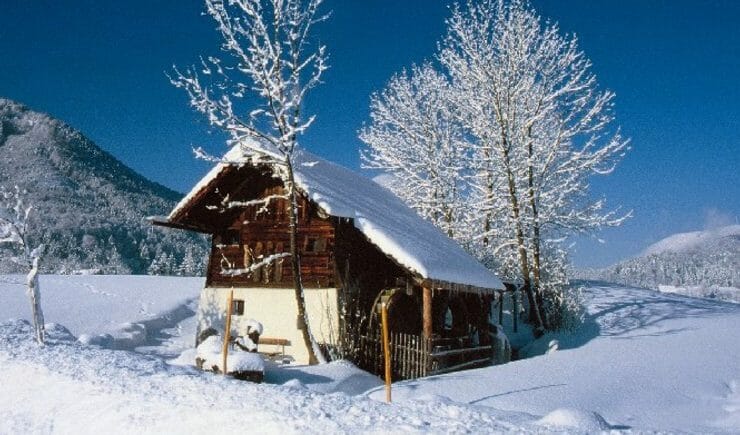 a house covered in snow