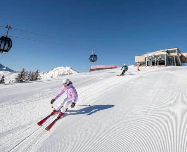 two skiers on perfect slopes