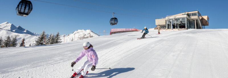 two skiers on perfect slopes