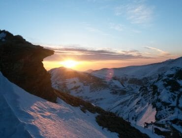 a view of a snow covered mountain