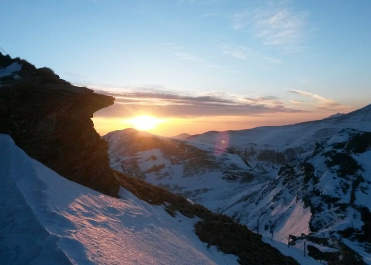 a view of a snow covered mountain