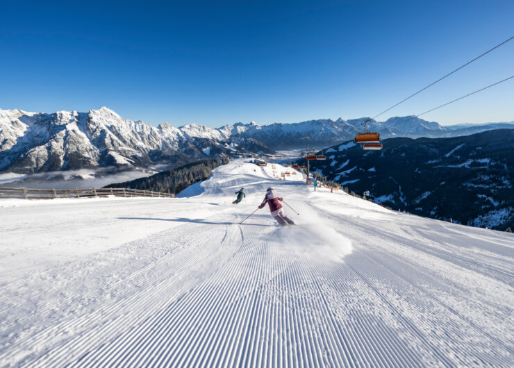 Freshly groomed slopes are perfect for gliding down into the valley.