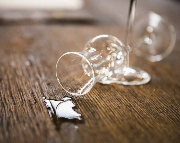 a close up of a glass on a table