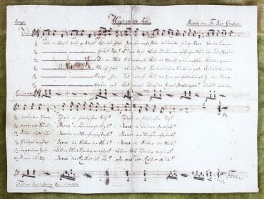 Autograph – Salzburg a close up of text on a white background