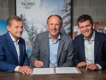 a group of people sitting at a table