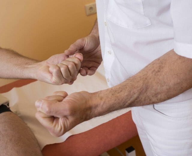 heilstollen a man in a white shirt holding someone's hand