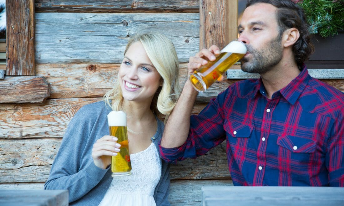 a couple drinking Beer