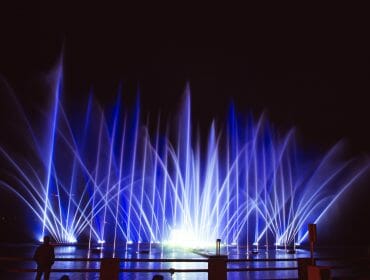 a fountain show at night