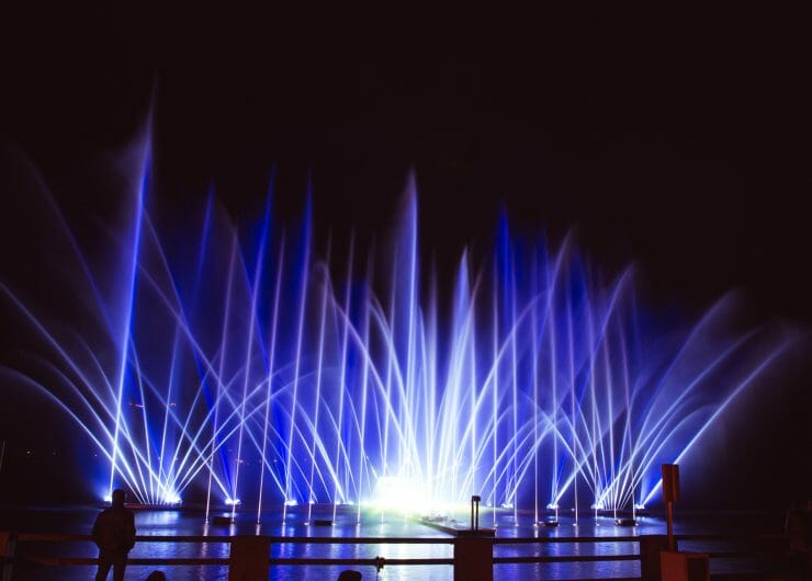 a fountain show at night