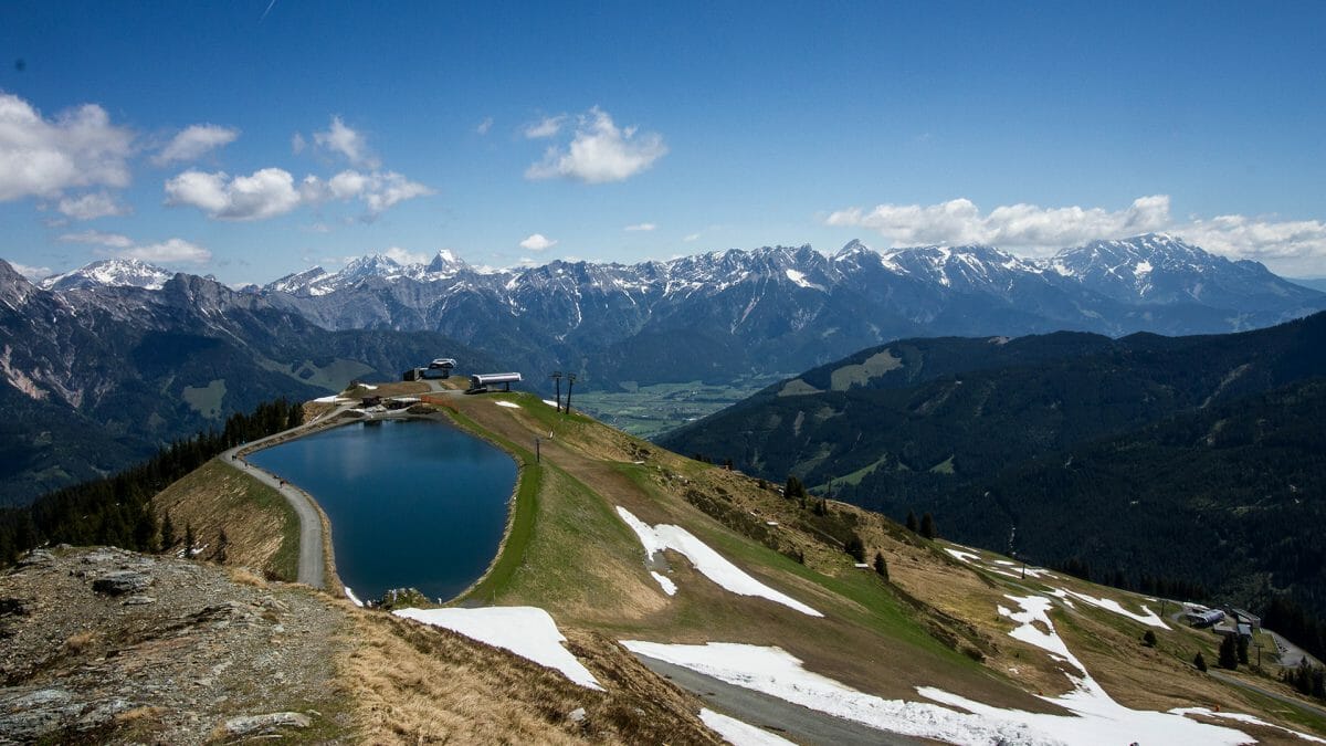 Wells mountain. Леоганг. Озеро в Австрии в горах Леоганг. Leogang Handl. Leogang Wood of Fame.