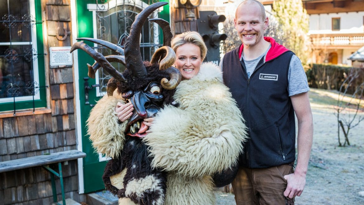 Alexandra Meissnitzer with Schnitzer Clemens Hübsch and one of his Krampus Masks