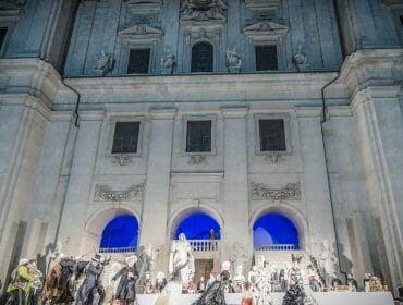a group of people in front of a building