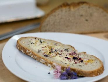 a piece of bread on a white plate