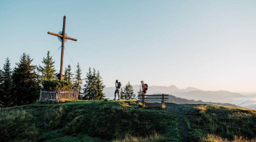 a person standing on top of a hill