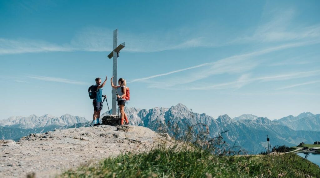 a man standing on top of a mountain