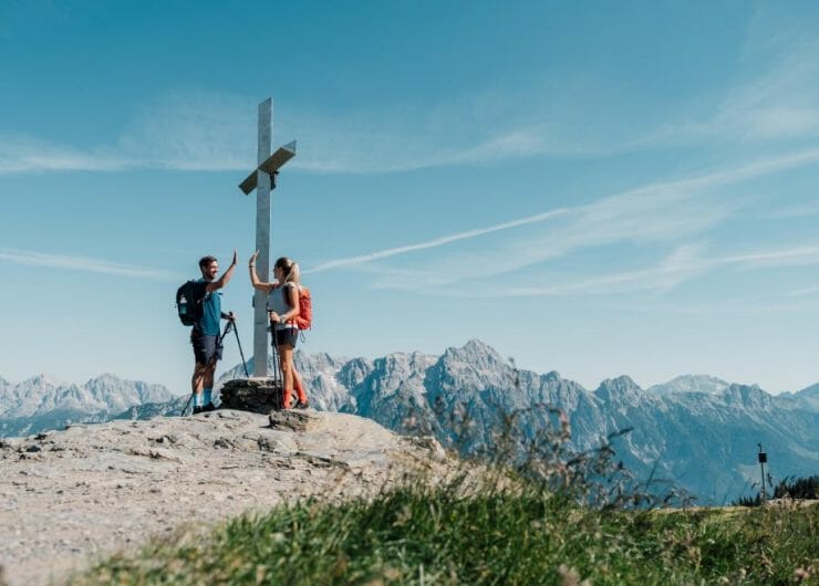 a man standing on top of a mountain