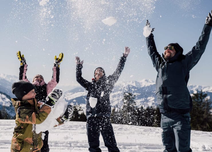 Family having fun in the snow