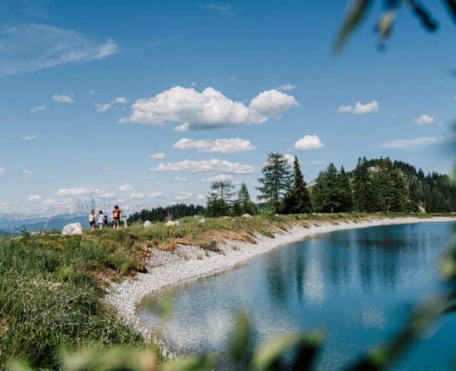 Family day hiking in St. Johann in Salzburg Natural landscape and mountain lake in St. Johann in Salzburg
