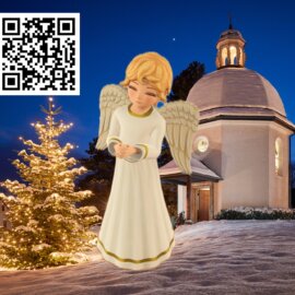 An augmented reality angel in front of the Silent Night Chapel in Oberndorf