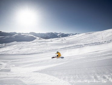 Síelő a Wildkogel-Arena Neukirchen & Bramberg régióban